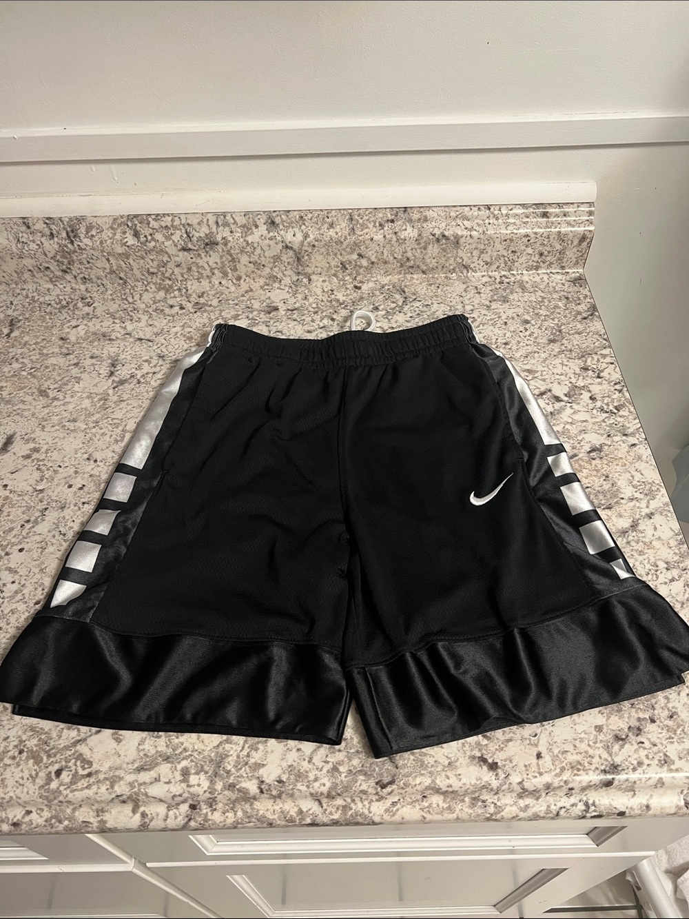 Nike Black basketball Shorts with White Side Accents